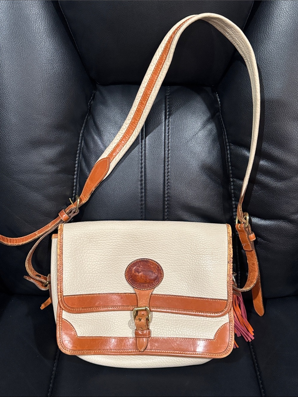 Dooney & Bourke Cream and Tan Pebbled Leather purse
